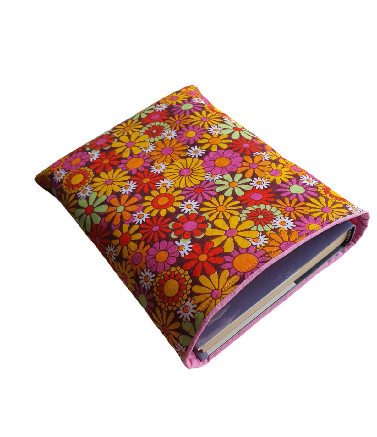 In this photo it shows a medium hardback can be protected by this handmade padded Book Pouch, however, the photo is for illustration purposes only and is not included.