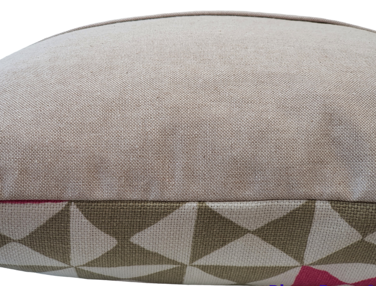 This photo shows some of the patterned front with the plain neutral fabric on the reverse. The reverse of the cushion cover also has an enclosed zip.