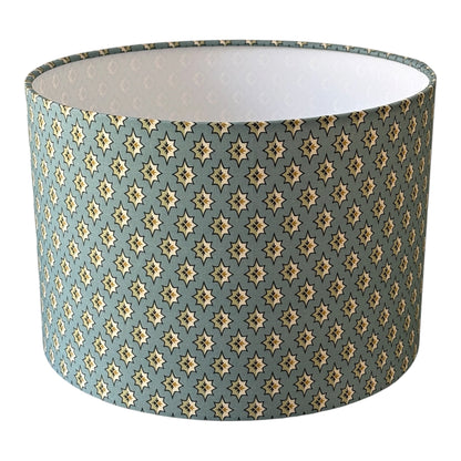 Handmade 30cm drum lampshade made using Selsey fabric in China Blue from the Titley and Marr range of fabrics.