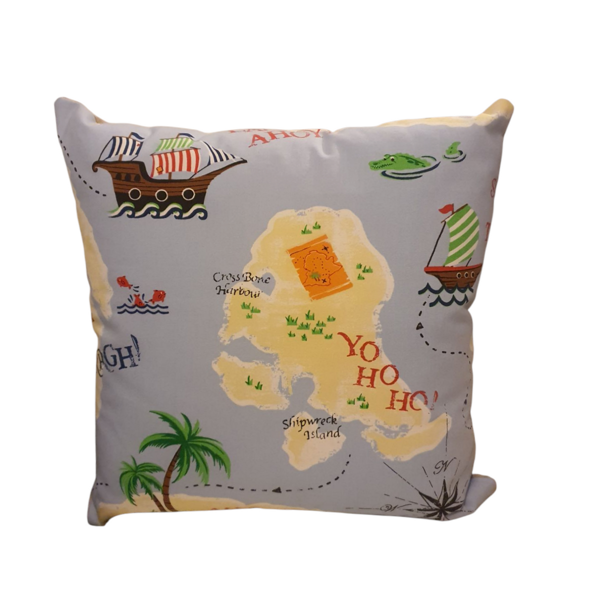 The front of the cushion cover showing pirate ships and an island against the sea background.  The cushion cover is approximately 17 inches square (44cmsx 44cms).
