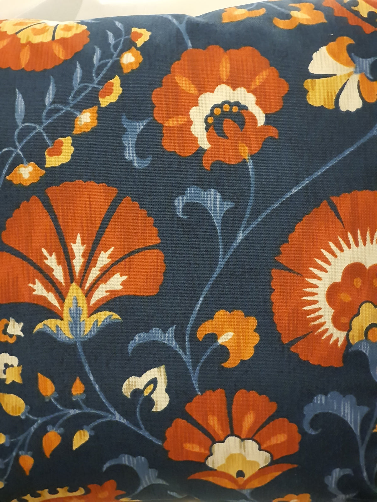 A close up of the Indigo Chamonix fabric showing the Jacobean style pattern on the lovely blue/indigo background.