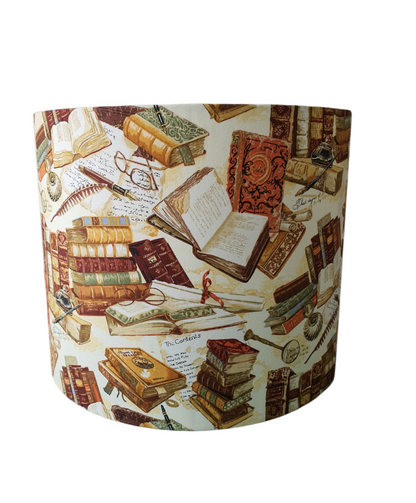 Library Books drum lampshade showing open books and stacked volumes.