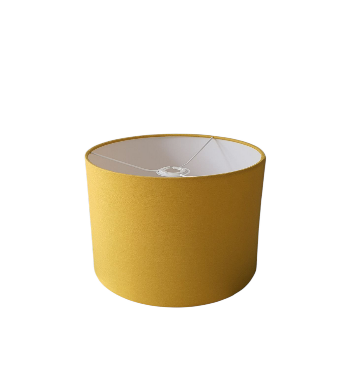 A photo of the drum 30cm shade showing the rings at the top as the shade can be used for a lamp base or a ceiling fitting as plain yellow fabric has been used to make the shade.