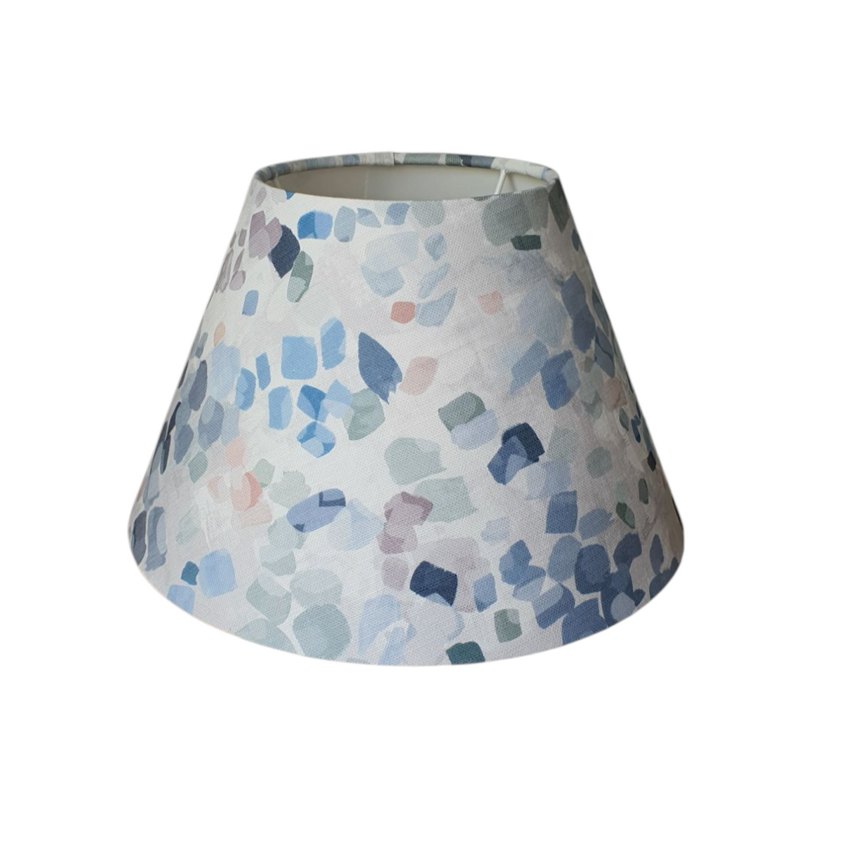A photo of the coolie shade which shows a closer view of the blue and grey abstract pattern.