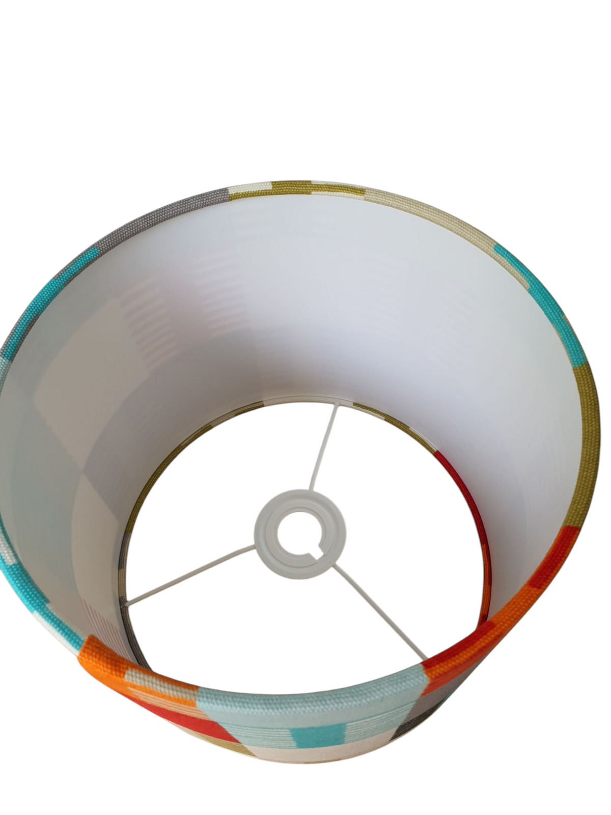 A view of the drum lampshade from the top of the shade looking inside the drum inside towards the rings.