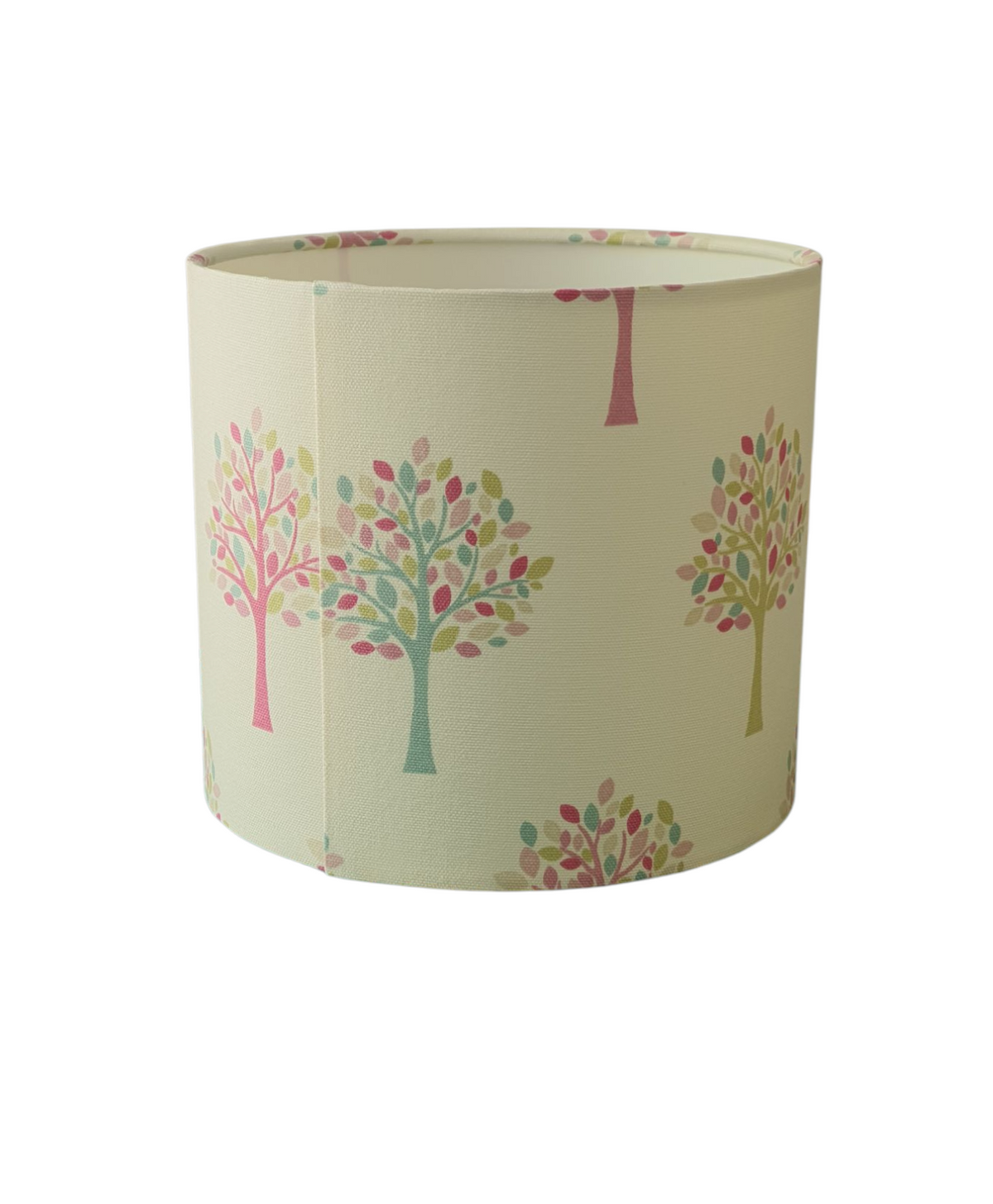The join at the back of the handmade lampshade.  The fabric may not match at the join to to pattern placement and pattern repeat.
