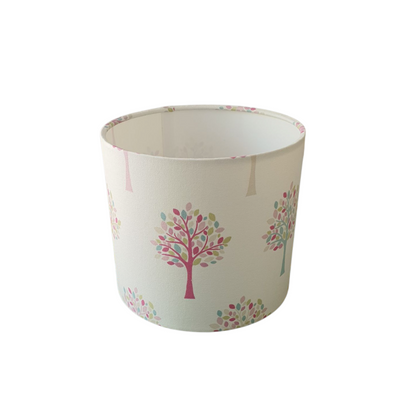 The fabric pattern is different coloured trees with pastel coloured leaves which make up the pretty pattern on the Fryetts Orchard fabric.