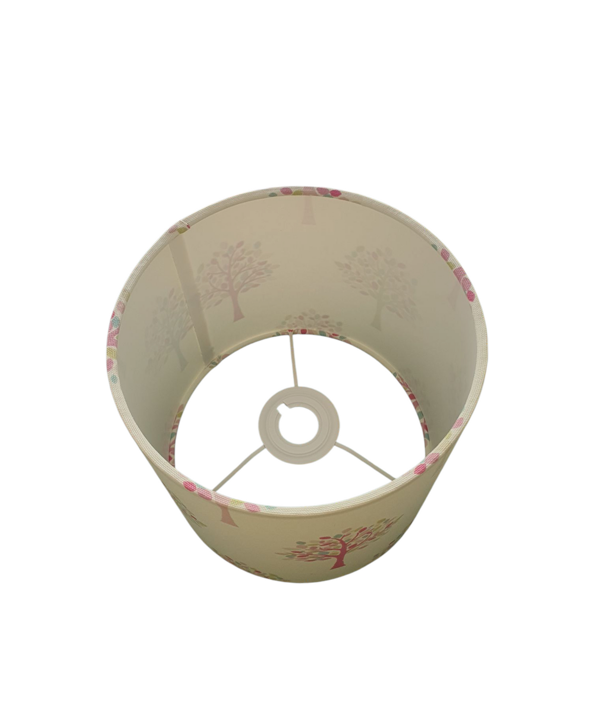 A photo looking down towards the bottom ring which shows the fitting which can be removed to convert from a UK standard lamp fitting to a European fitting.