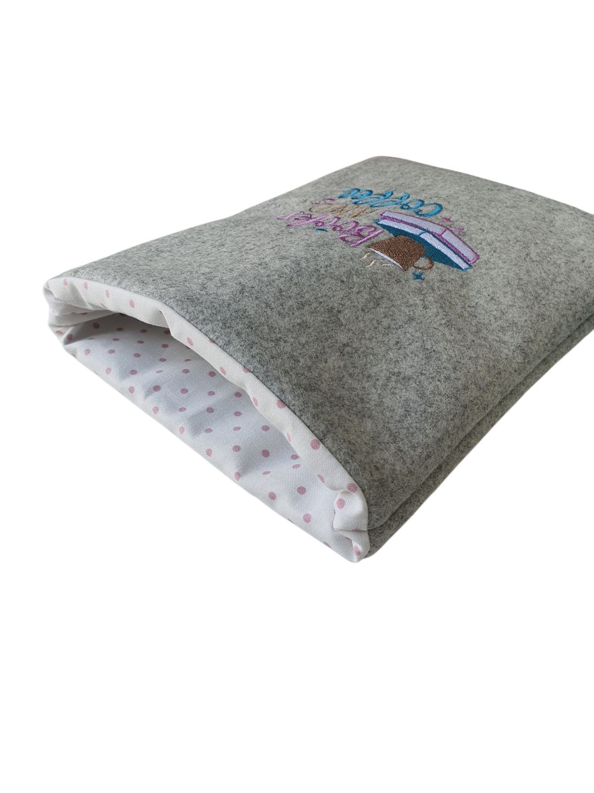 Another photo which shows more clearly the polka dot fabric which lines the handmade padded Book Pouch.  