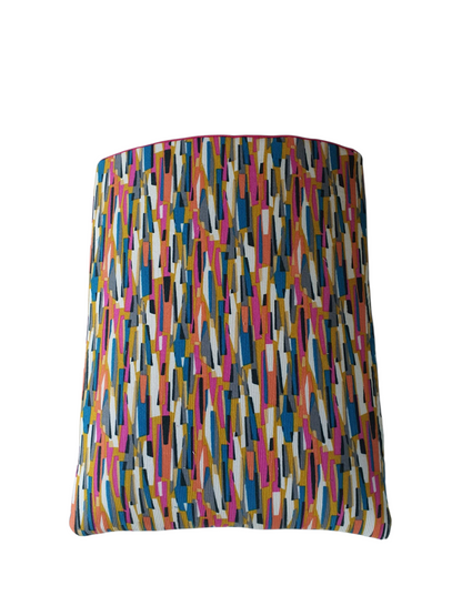 A full on photo of the multicolour stripe needlecord fabric used to make the handmade padded Book Pouch.  he handmade Book Sleeve is 8 inches by 10 inches (20cms x 25.5cms)