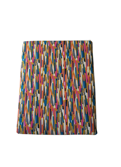 This photo shows full multicolour stripe pattern of the foam padded handmade Book Pouch.  The handmade Book Sleeve is approximately 8inches by 10 inches (20cms x 25.5cms).