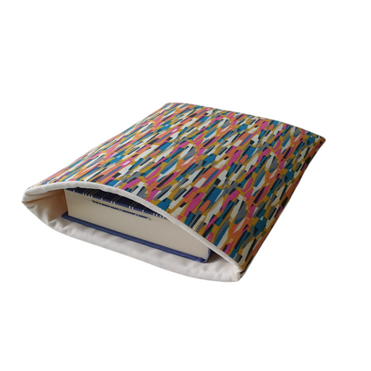 The foam padded Book Pouch would make an ideal Book Lovers Gift.  It would also offer some protection for a Kindle, e-Reader or Tablet but check the measurement of your device prior to placing an order.
