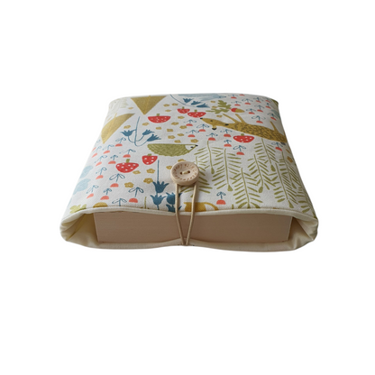The padded pouch will protect precious paperbacks from wear and tear whilst being carried in a bag.  The Book Sleeve would also offer some protection for a Kindle.