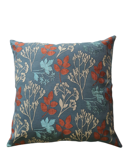 Handmade zipped cushion cover made with Prestigious Textiles Elliott Teal Peacock fabric.  The cushion cover is complemented by neutral fabric on the reverse and fastens with an enclosed ip.