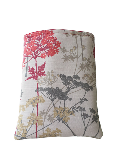 The handmade Book Cover is made with Hedgerow Country Floral Ruby fabric.  The Book Cover is approximately 9.5 inches by 7.5 inches and would also offer protection for a Kindle or e-Reader but check the measurement of the device prior to placing an order.