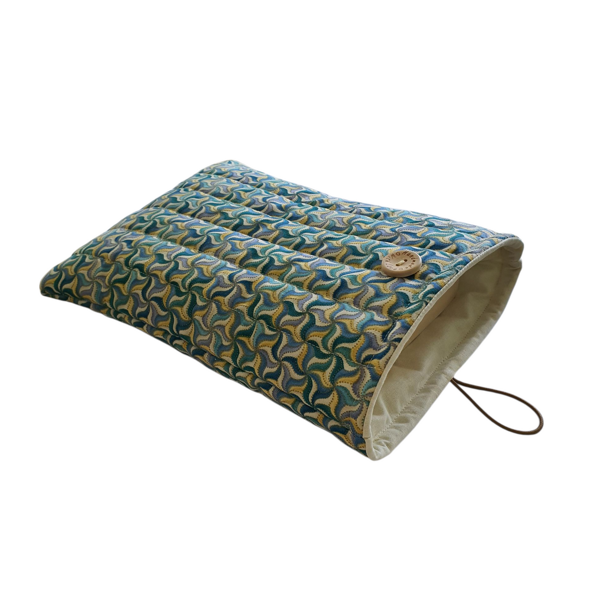 A side view of the padded Book pouch showing plain fabric inside the Book Pouch and the button and elastic fastening.