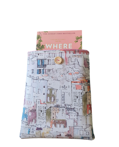 The padded Book Cover will protect precious books from wear and tear whilst being carried on the go.  The book is not included and is for illustrative purposes only.