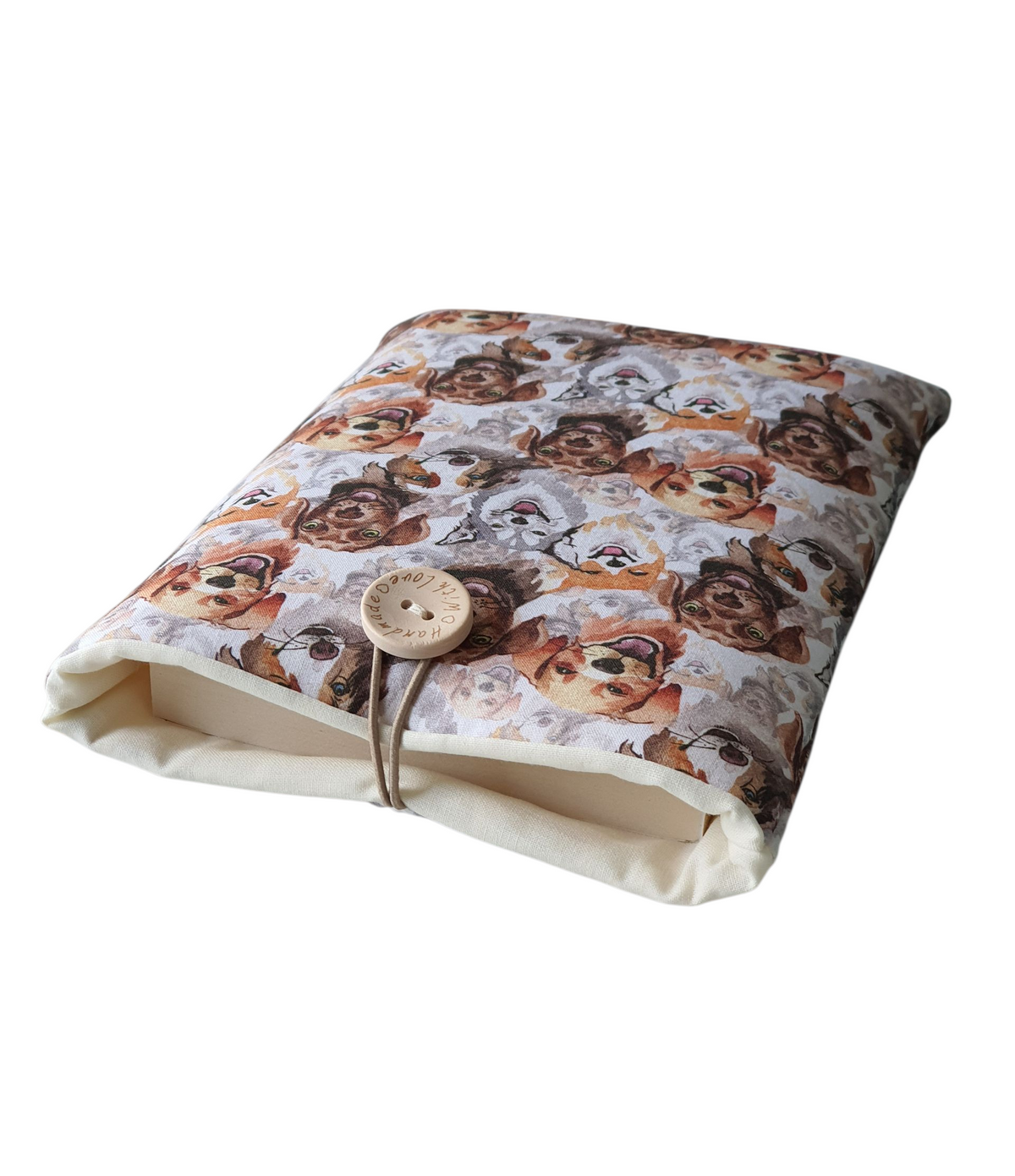The handmade Book Cover is padded with foam, lined with neutral fabric and has elastic and button closure.  Please note the book is for illustrative purposes only and is not included.