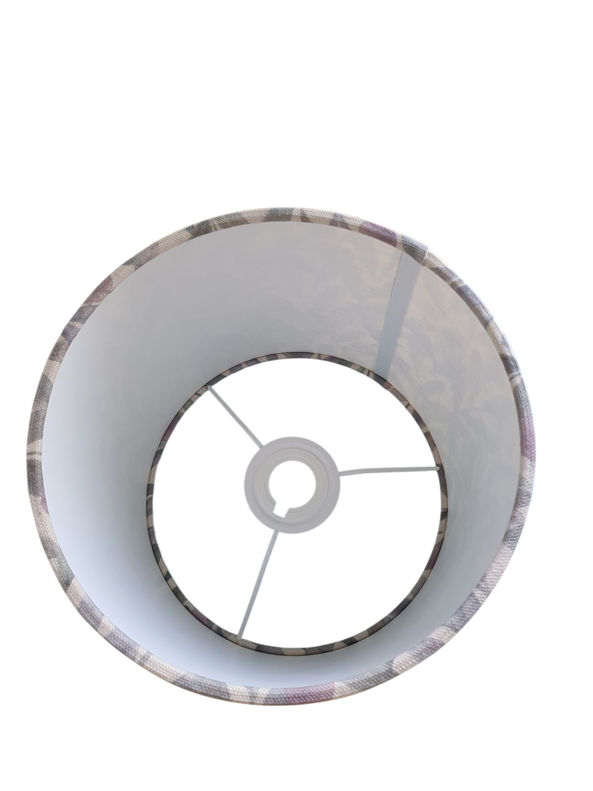 A view of the handmade drum lampshade looking down from the top of the shade to the lampshade fitting.