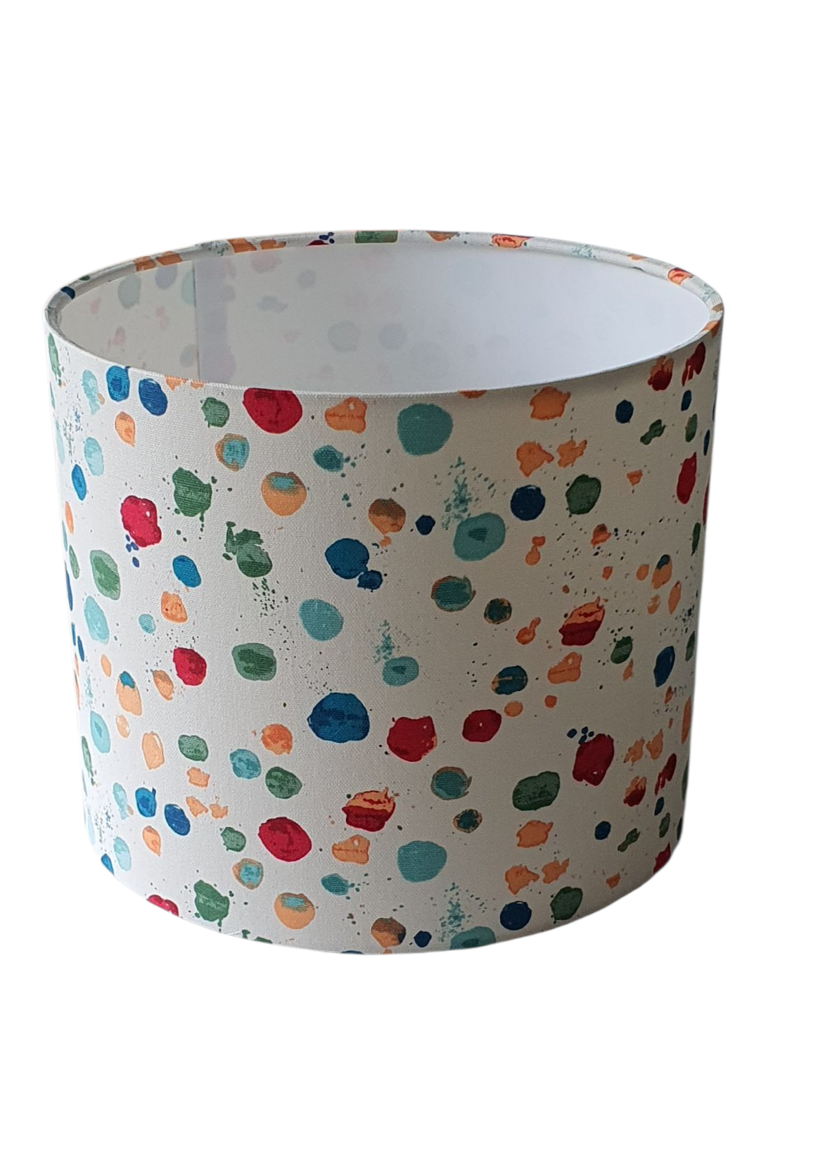 The handmade shade is lined with white fire retardant PVC which meets UK standards and has passed the Lighting Association Glow Wire Test.