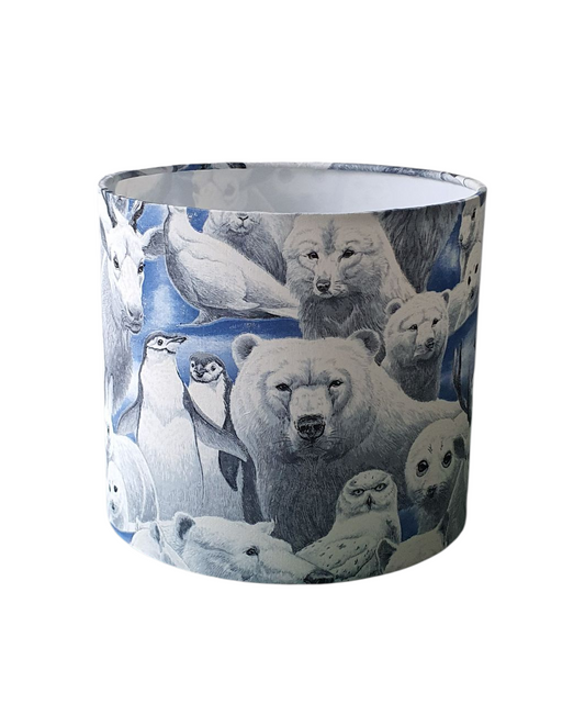 Winter Animals drum lampshade showing polar bears and winter animals on blue fabric.