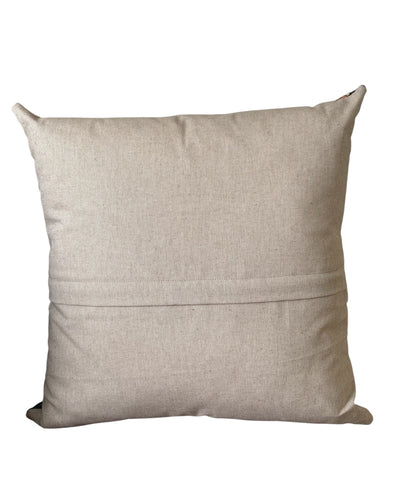 The reverse of the cushion cover and the enclosed zip is beneath the small flap shown in the photo.  The cushion cover is approximately 17.5 inches by 17.5 inches (44cms x 44cms).