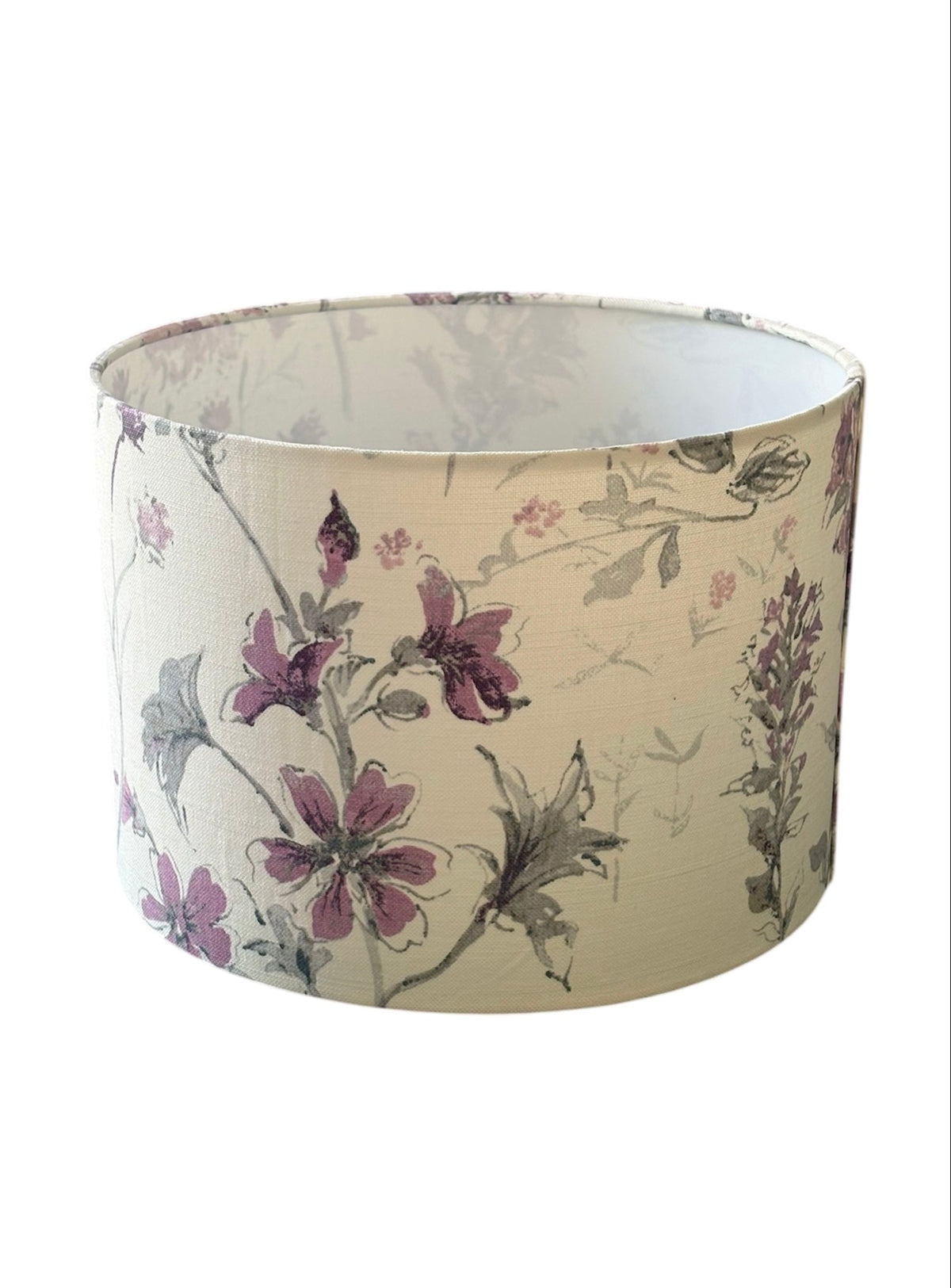 Laura Ashley Wild Meadow drum lampshade view of lilac wildflowers and stems.