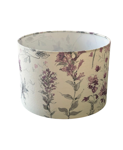 Laura Ashley Wild Meadow drum lampshade side view of lilac flowers and foliage.