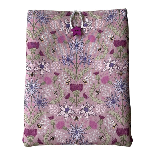 Purple Thistle and Bees Padded Book Sleeve, showing the fabric pattern