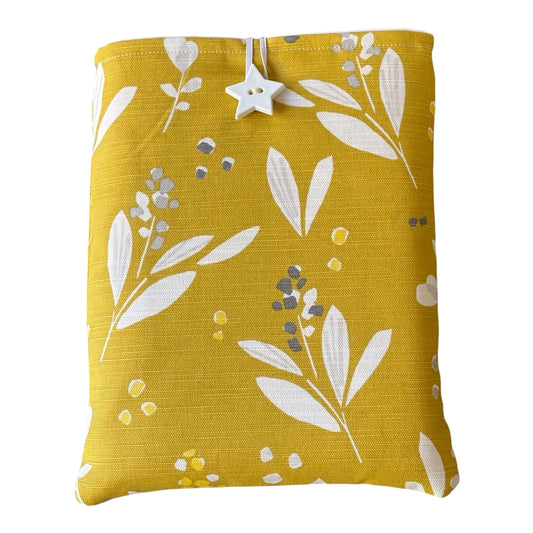 Mustard Yellow Botanical Padded Book Sleeve, showing the fabric pattern