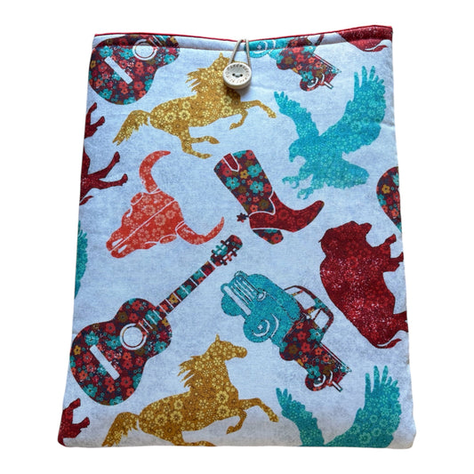 Handmade padded book sleeve with button fastening