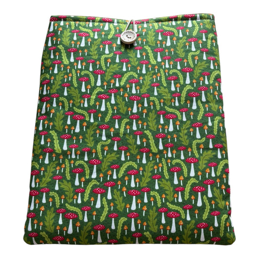 Green Toadstool Padded Book Sleeve, showing the fabric pattern