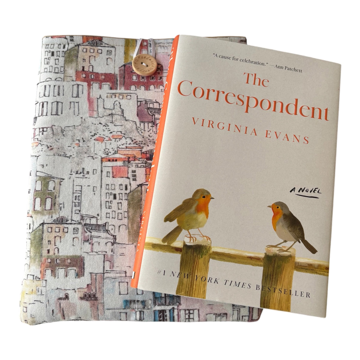 The handmade padded pouch has been made with Italian houses themed fabric, is padded with fusible fleece and polyester wadding, lined with neutral fabric and finished with button and elastic closure.  Please note the hardback book in the photo is not included and is for illustrative purposes only.