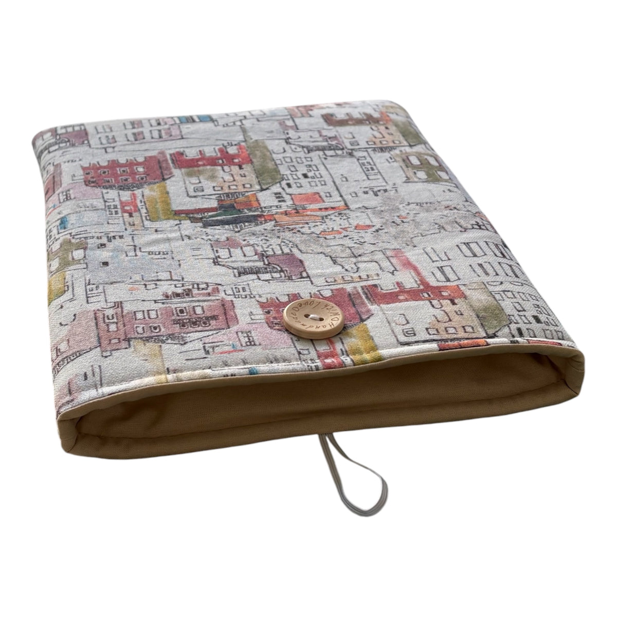This photo shows the lining, button and elastic closure.