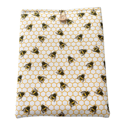 
Honeycomb Bees Padded Book Sleeve, showing the fabric patter.