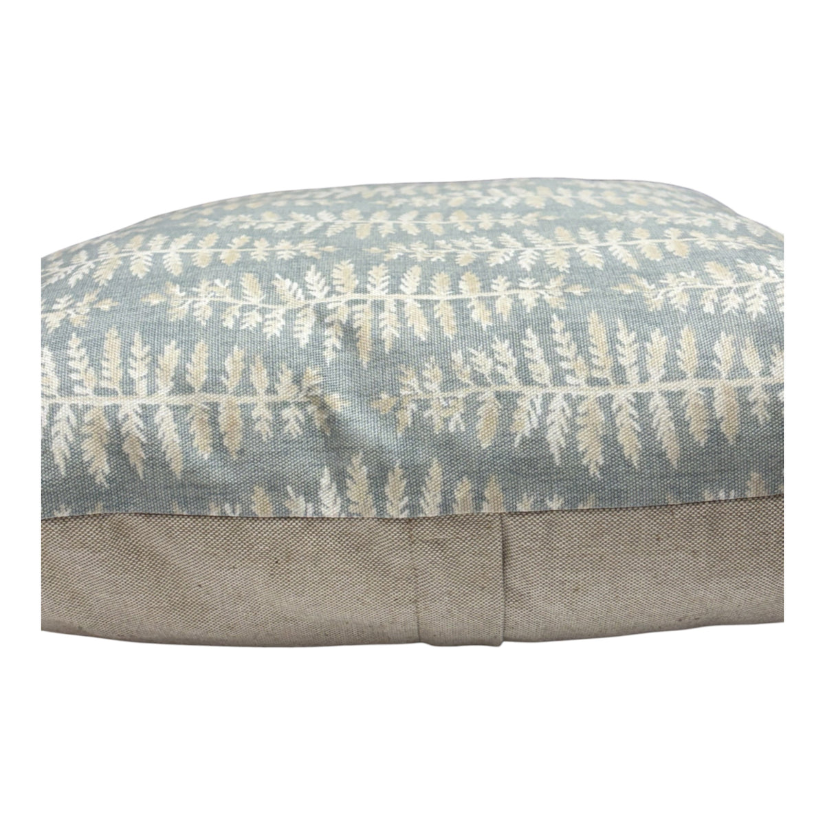 The cushion cover fastens with an enclosed zip in the rear of the cushion cover, as indicated.