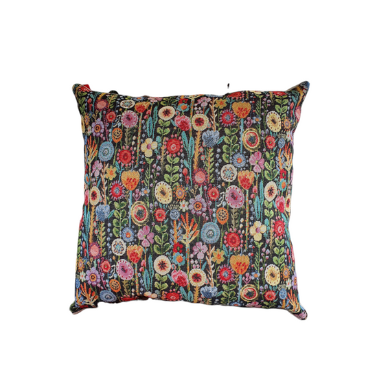 Handmade Kew Gardens floral cushion cover in black which fastens with an enclosed zip in the reverse of the cushion.