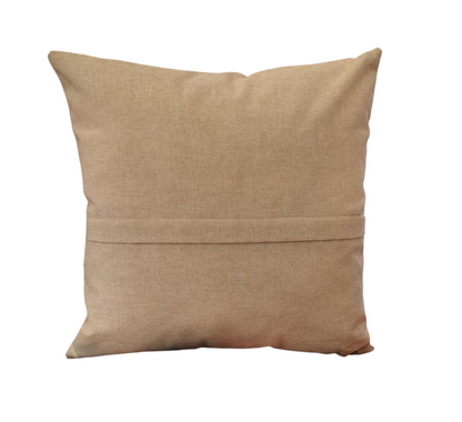 The reverse of the handmade cushion cover in complementing neutral fabric, which fastens with a zip.  As indicated in the photo the zip is enclosed under the small flap.